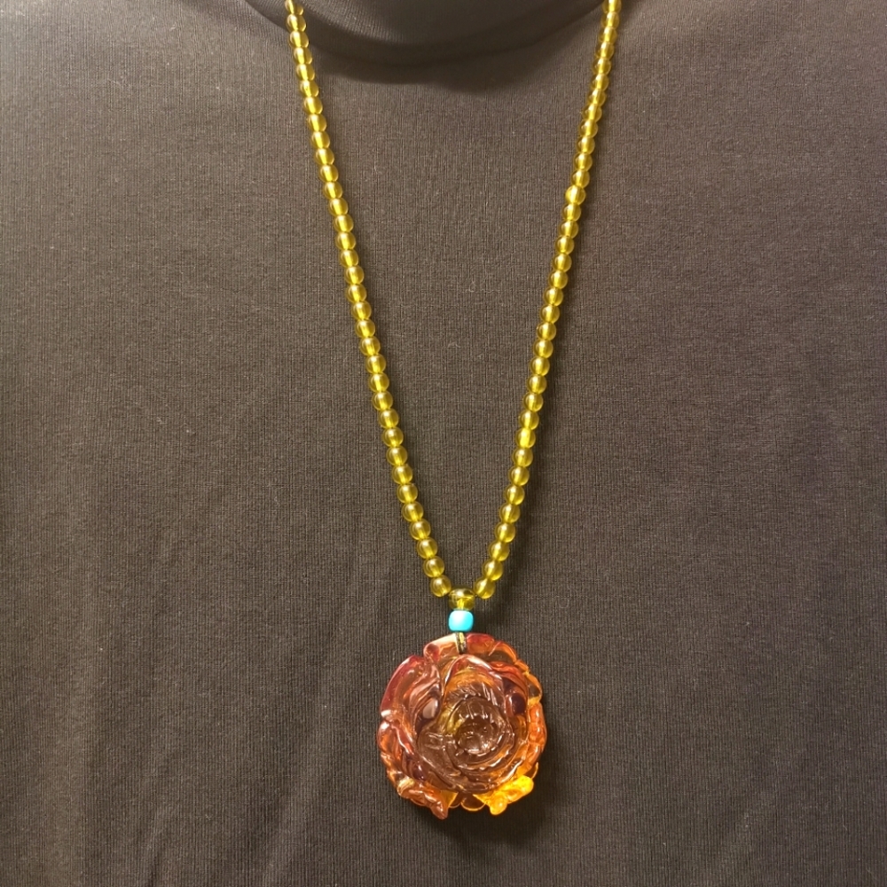 Amber flower pendant long necklace.